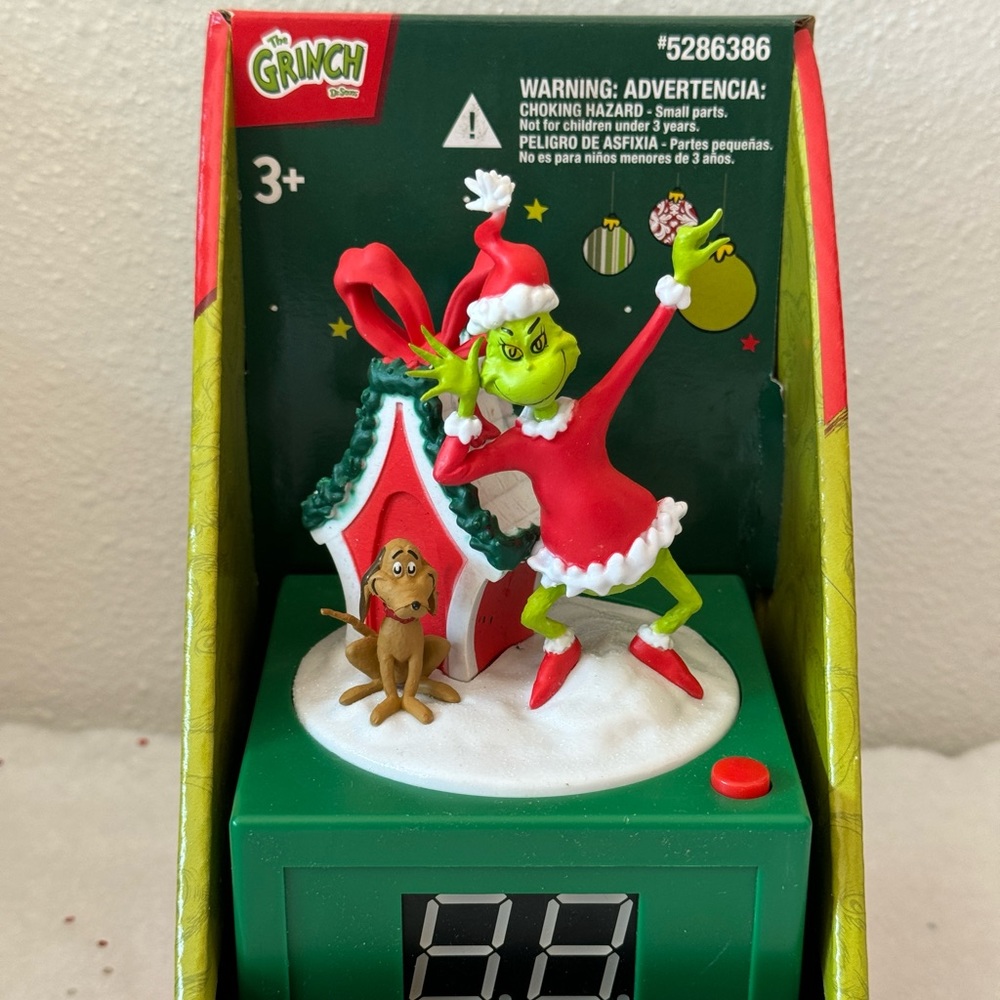 The Grinch CHRISTMAS DECOR in Indoor countdown clock: 5.5-in x 3.3-in x 3.3inch.